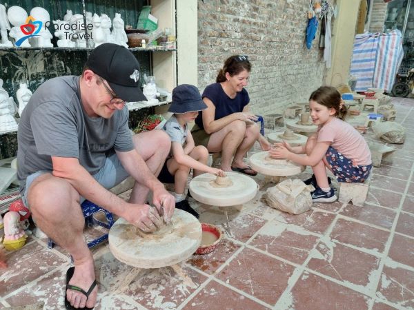 Paradise Travel customers make pottery by themselves