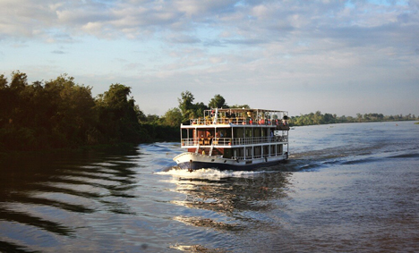 Angkor – Phnom Penh Cruise by Toum Tiou